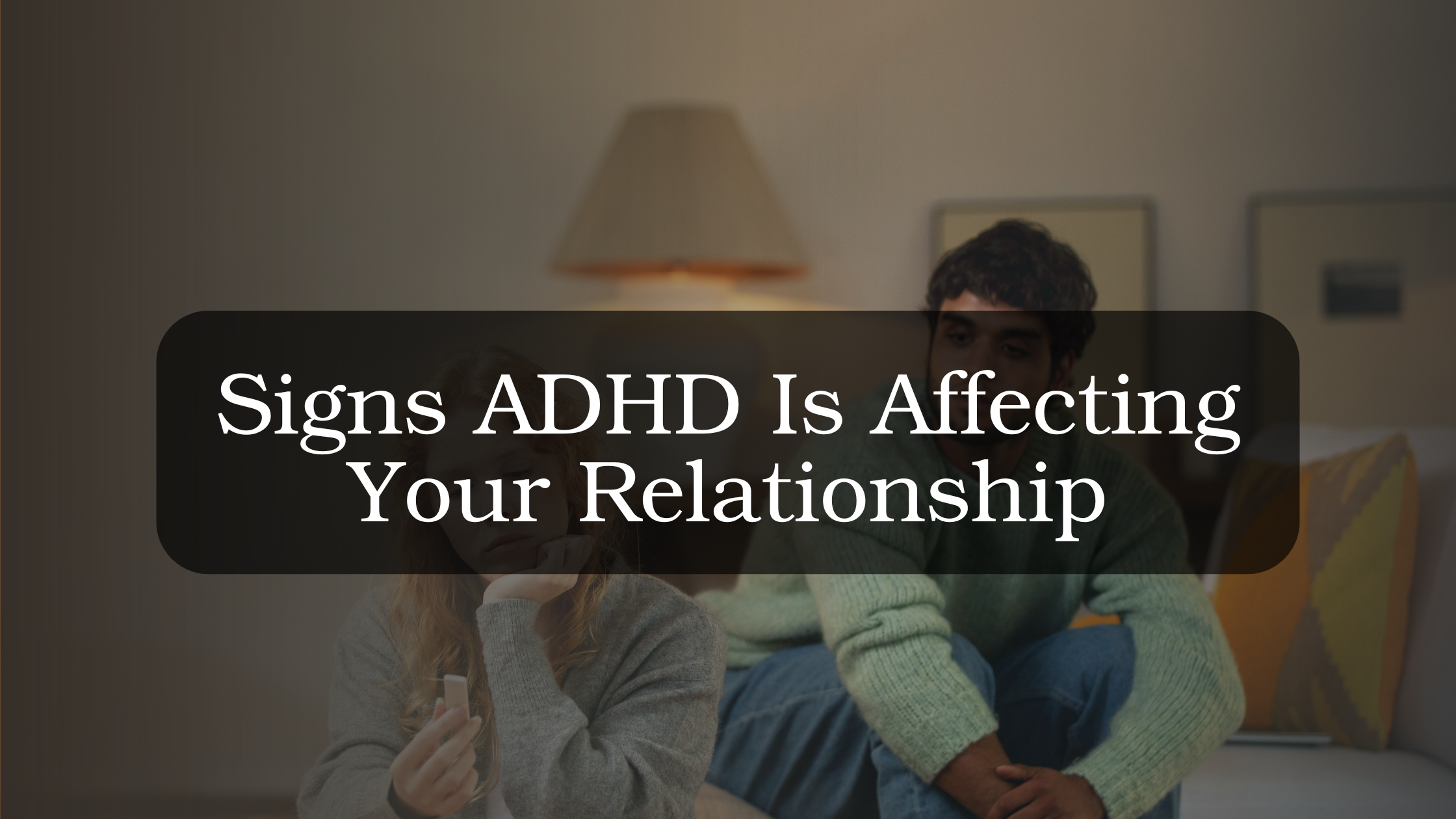 Couple experiencing frustration and distraction during conversation, representing how ADHD symptoms can impact communication and connection in a relationship