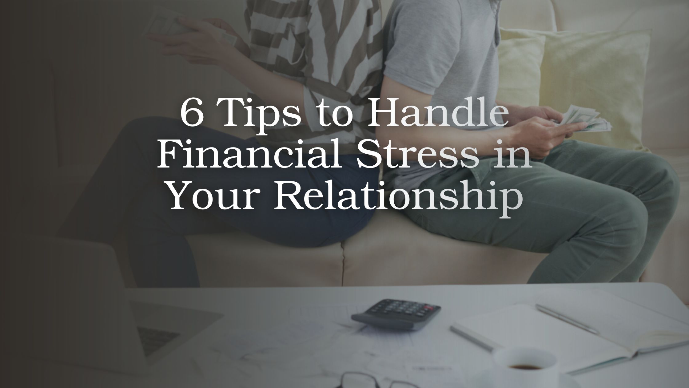 Couple discussing financial stress and money concerns in a relationship at home