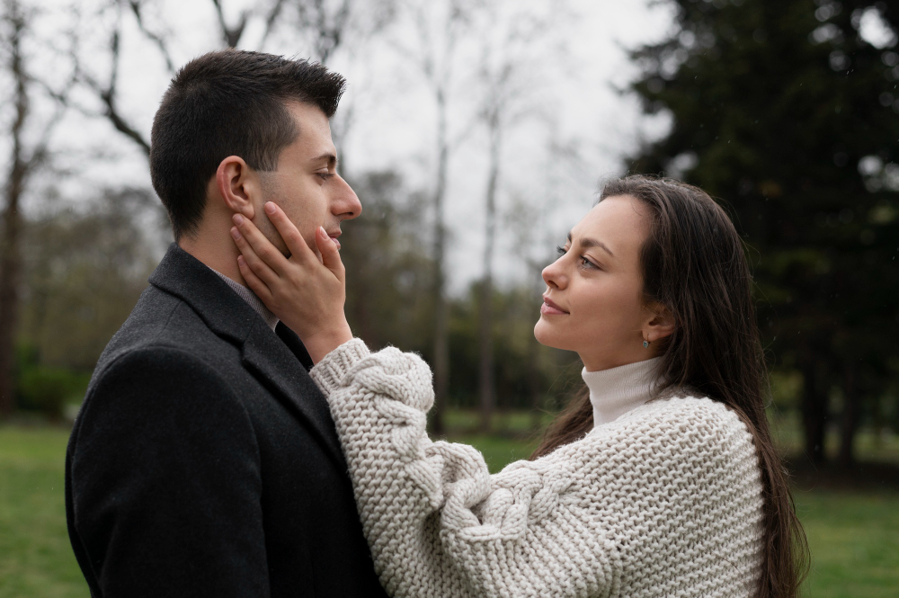Couple sharing a calm and emotionally connected moment outdoors, reflecting healthy tone of voice and supportive communication in a relationship.