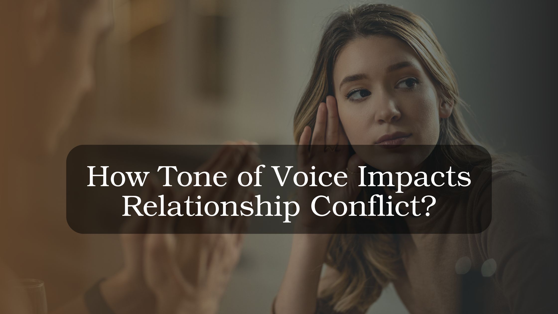 Couple experiencing emotional tension during a conversation at home, highlighting how stress, communication tone, and emotional disconnection can affect relationships.