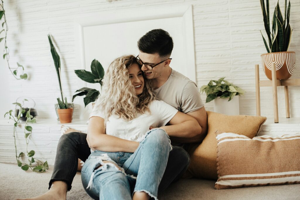 Couple showing intimacy and emotional connection in a relationship after infidelity discussion