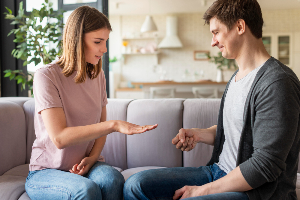 Couple reconnecting after a disagreement through positive communication and mutual understanding, demonstrating healthy conflict resolution and emotional connection in marriage.