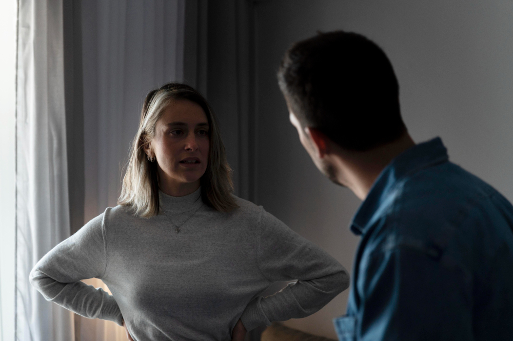 Couple discussing a current relationship issue while avoiding past conflicts, demonstrating healthy communication and respectful conflict resolution in marriage.