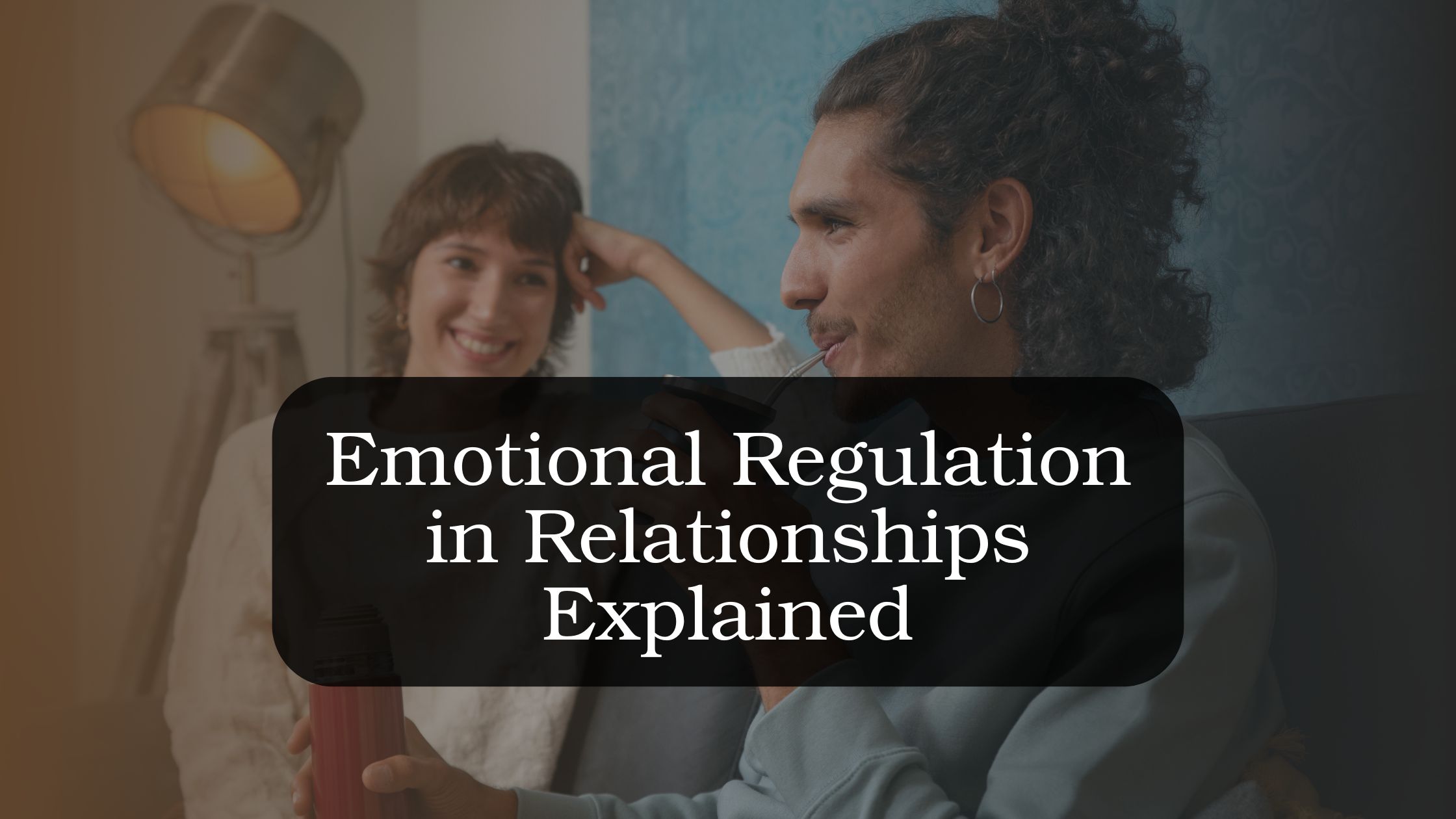 Couple engaging in a calm and attentive conversation at home, illustrating emotional regulation in relationships, healthy communication, emotional awareness, and stronger relationship connection.