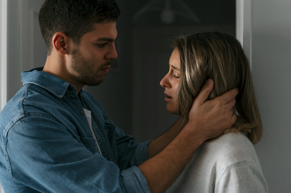Couple sharing an emotional moment that illustrates how unresolved childhood trauma influences adult attachment patterns, emotional vulnerability, and intimacy in marriage.