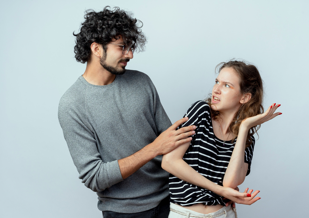 Partner appearing confused and distressed during a conversation, illustrating gaslighting and reality distortion in a narcissistic relationship.